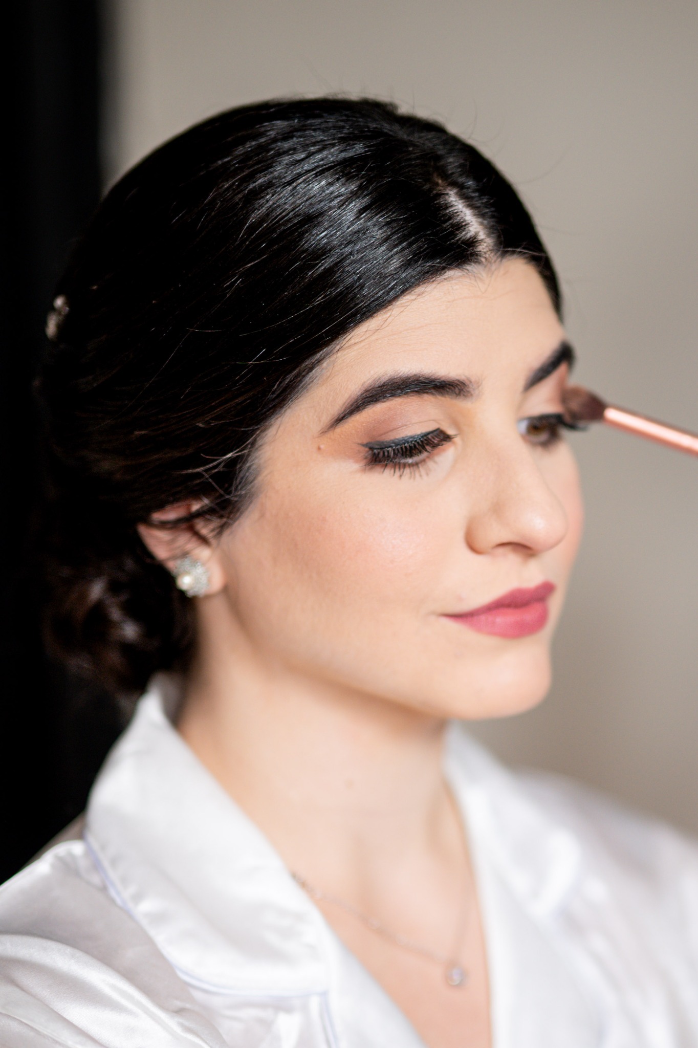 Close-up of bridal makeup preparation